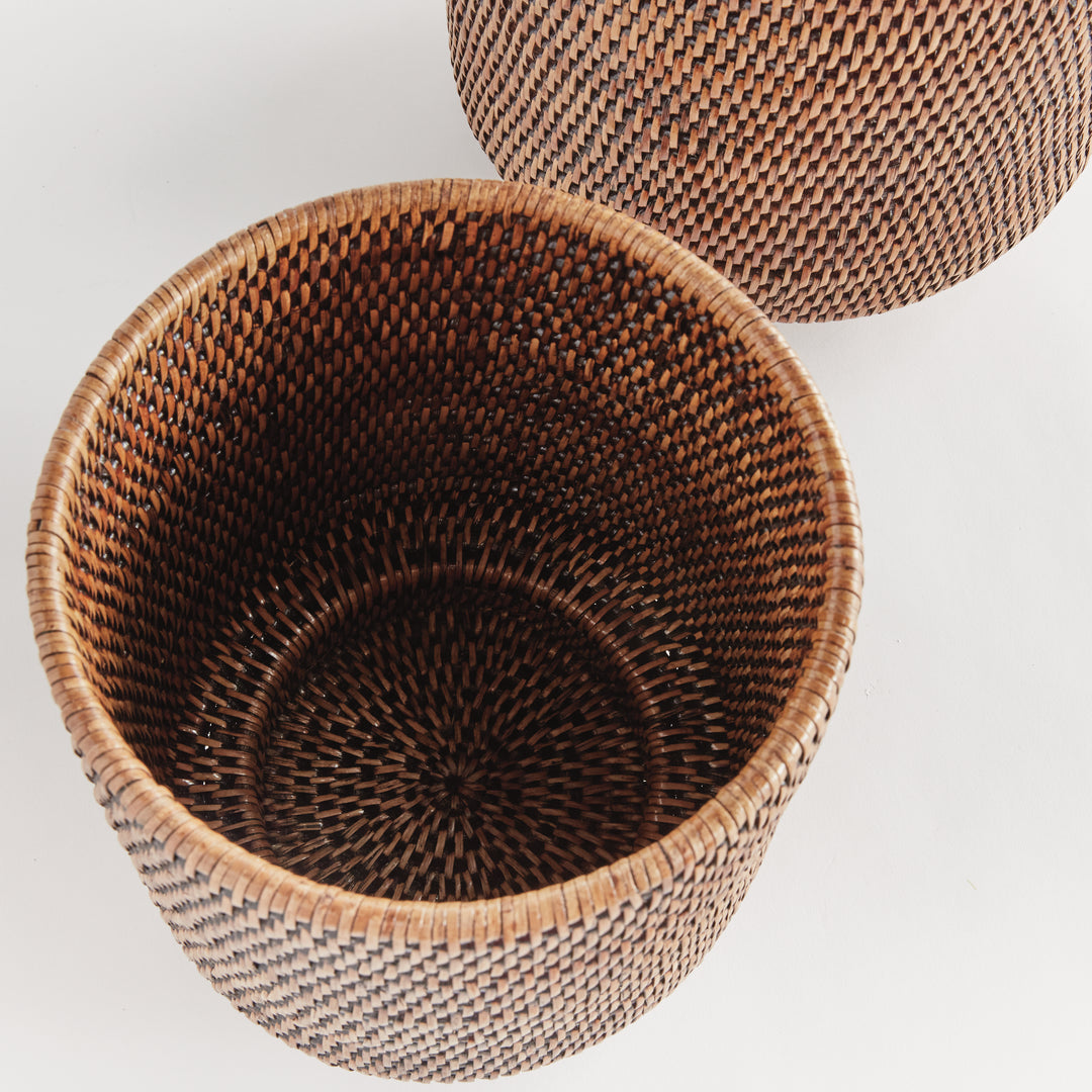 Brown rattan cachepots viewed from above, showing woven interiors and the circular pattern in the base - Coastal Transitional