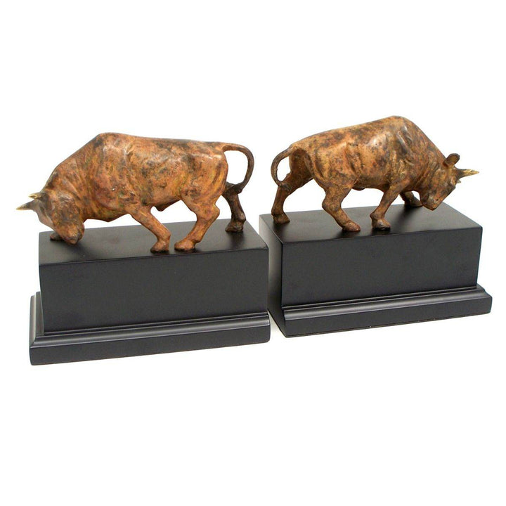 Brass bull bookends with flamed patina finish on black bases, 6.75 inch height, shown in side view for shelf and tabletop styling – Decorative Sculptural.