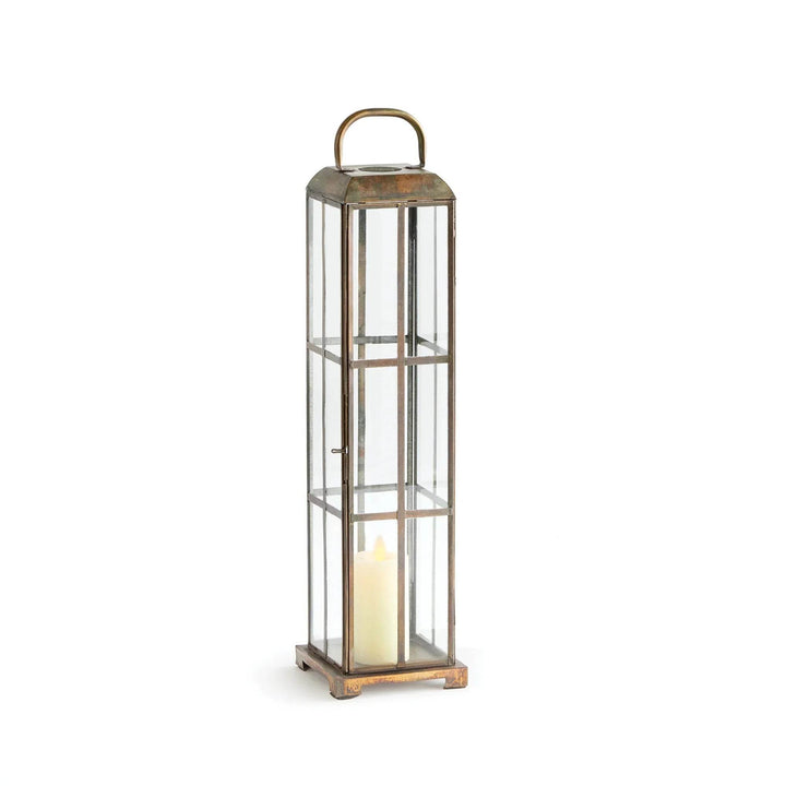 Slim brass and glass lantern with antique finish, shown with pillar candle inside, 19.75 inches high – Modern Farmhouse