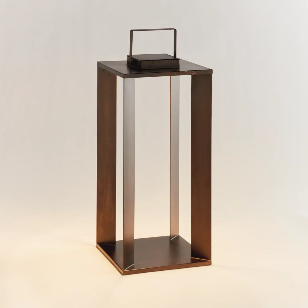 Brushed bronze solar LED lantern 24 inch outdoor metal lantern with warm glow and structured modern silhouette