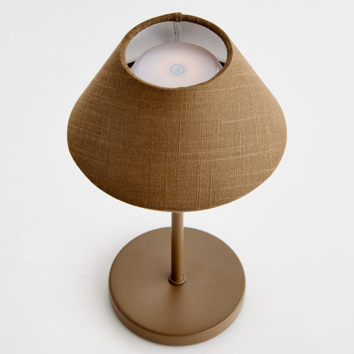 Top view of brown cordless LED table lamp showing touch control surface and linen empire shade – Coastal Transitional