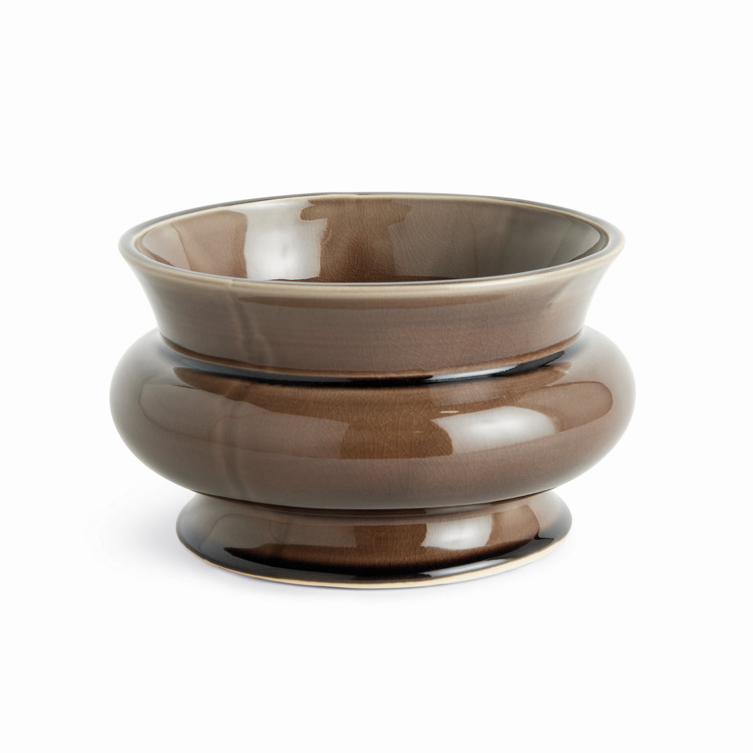 Brown wide ceramic cachepot with a glossy reactive glaze, broad rounded silhouette, and drain hole for indoor plants – English Country