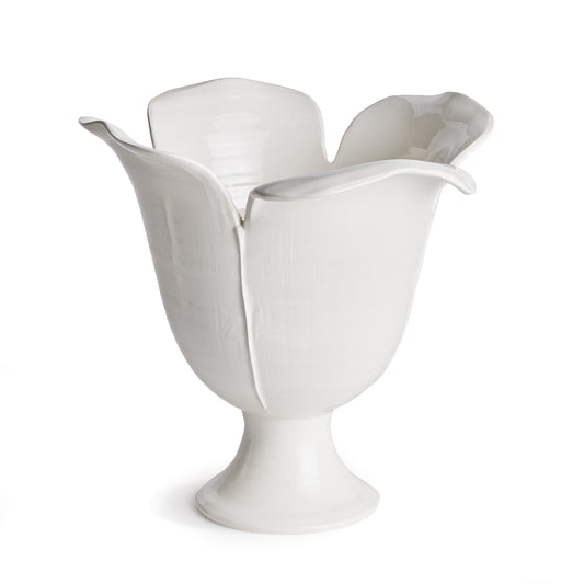 Each and every distinctive petal of the Petalo Vase is handmade, and hand-applied by Italian artisans in Tuscany, Italy. A subtle, open design in a soft white glaze. With a classic Italian craftsmanship passed down through generations, each piece is a true original. In grand scale, a dynamic centerpiece for feature table, kitchen island or mantel.