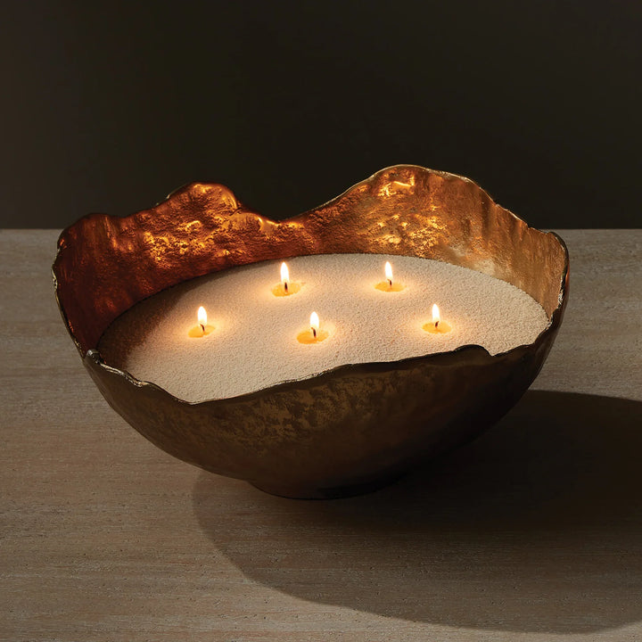 Cream candle sand in decorative pedestal bowl with multiple wicks creating warm glow, refillable candle kit for custom styling