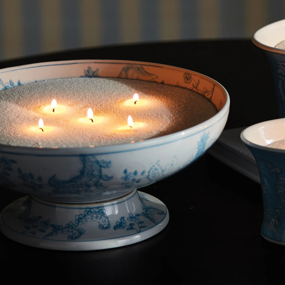 White candle sand in decorative bowl with multiple wicks creating soft ambient glow, refillable candle kit for custom vessel styling