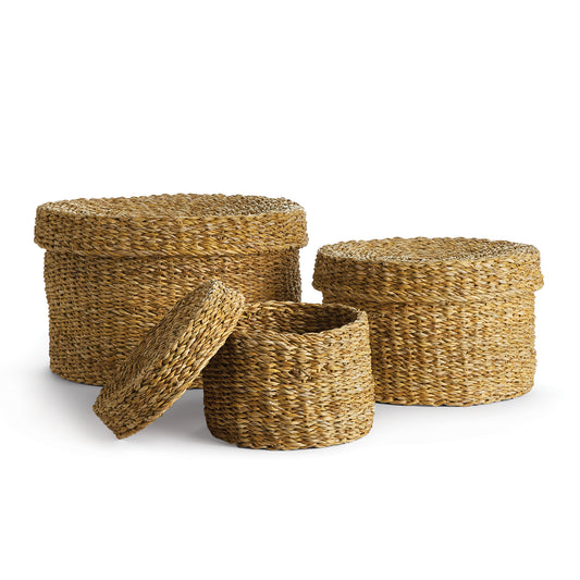 Our Seagrass is double-walled baskets that are supple, not stiff. They're beautiful in texture - just as nature intended. These round lidded baskets with lids are no exception. Use them as a catch-all in the foyer or on the family room ottoman. Casually versatile in every way.