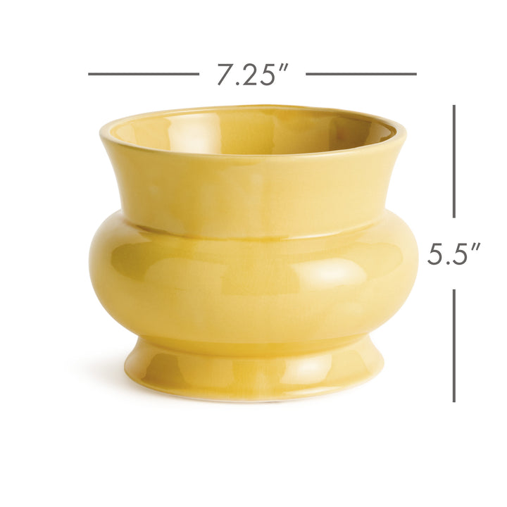 Dimension illustration of a ceramic cachepot measuring 7.25 inches wide by 5.5 inches high with rounded profile – English Country