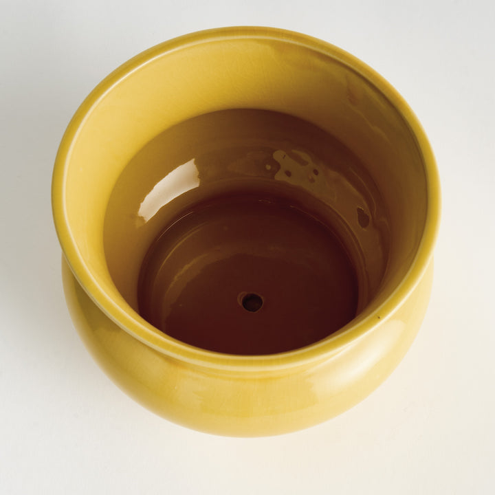 Top view of a glossy ceramic cachepot showing the finished interior and drain hole for indoor planting applications – English Country