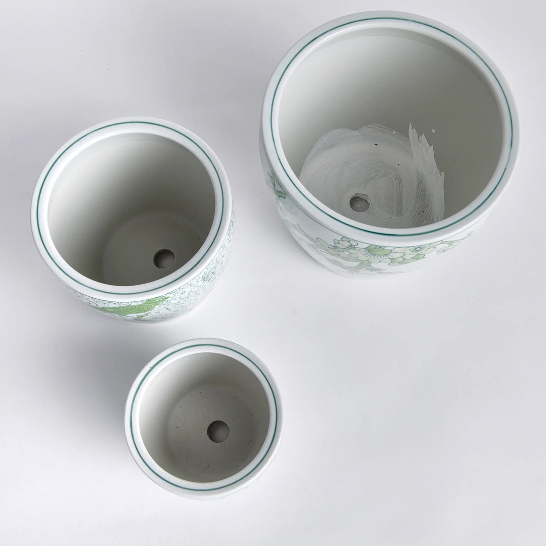 Top view of green and white ceramic planter set showing interior and drain holes for indoor planting use – Chinoiserie