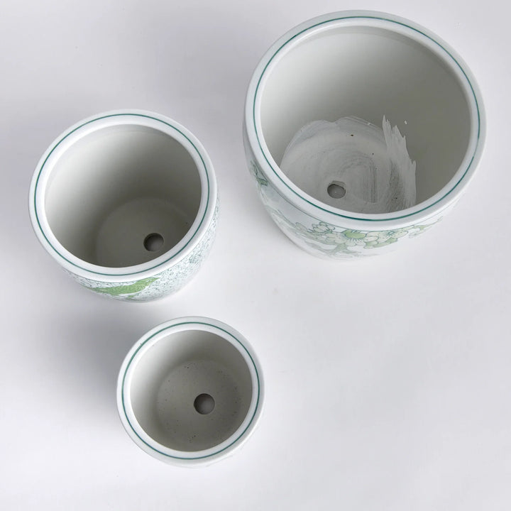 Top view of green and white ceramic planter set showing interior and drain holes for indoor planting use – Chinoiserie