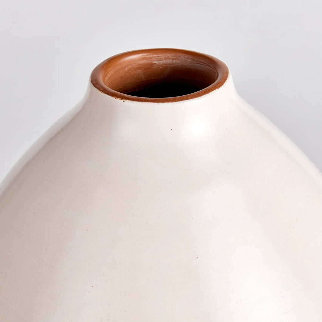 Close-up of ceramic vase rim showing natural clay interior and smooth matte exterior – Modern Organic