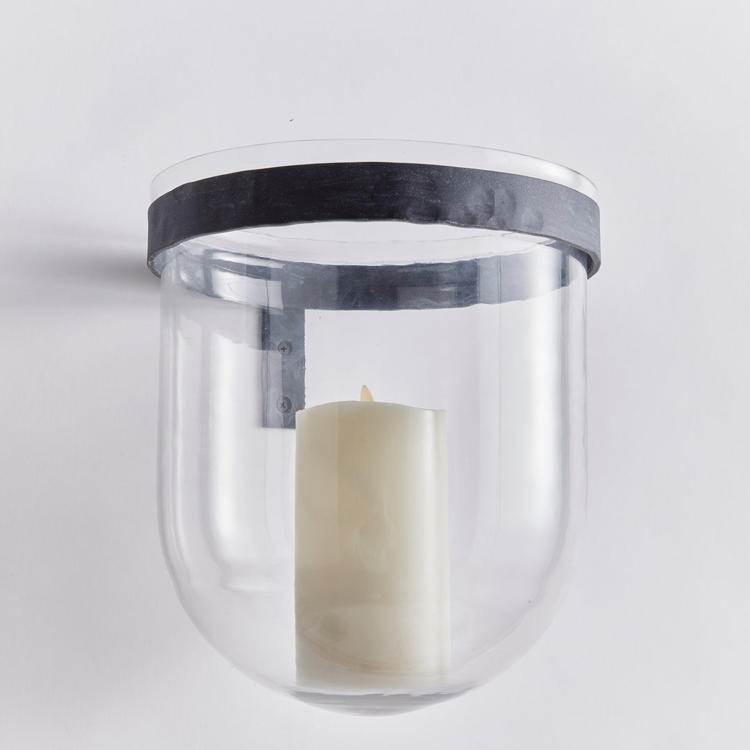 Clear glass wall candle holder with aged zinc band and LED candle, showing rounded vessel and wall mount in Modern Organic