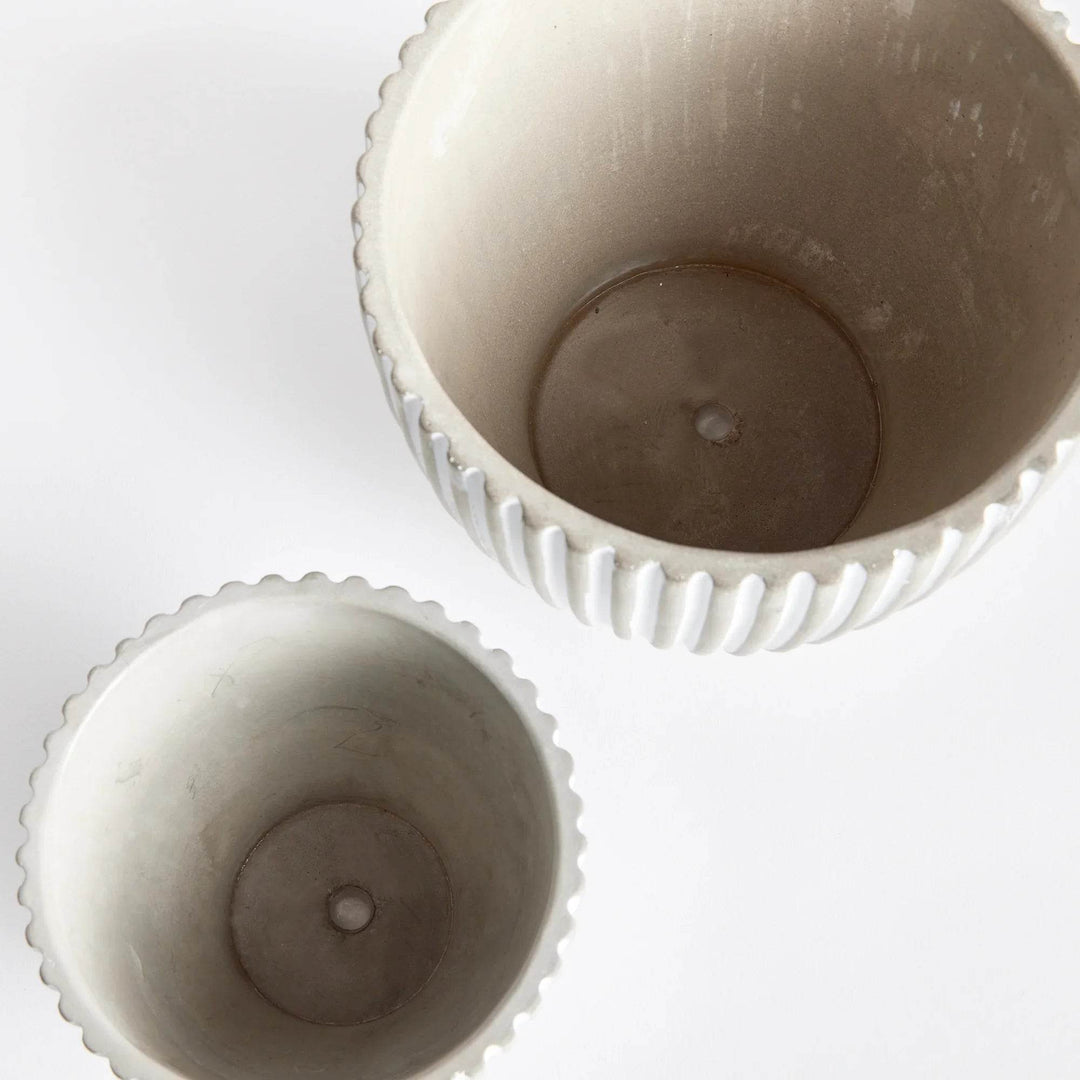 Top view of white concrete planter pots showing interior and built-in drainage holes for direct planting – Modern Organic.
