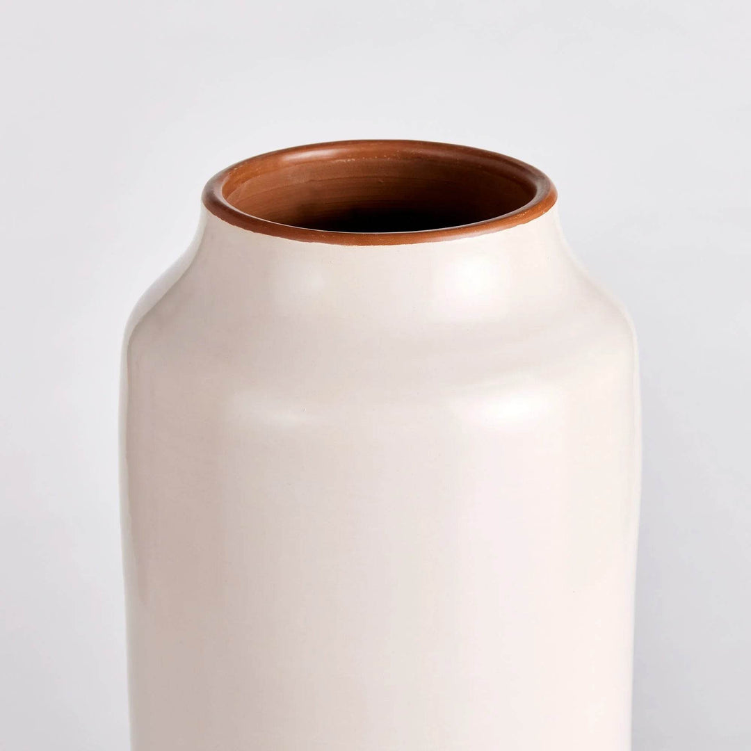 Side profile of tall cream ceramic vase showing soft taper, natural clay finish, and hand-burnished body – Modern Organic