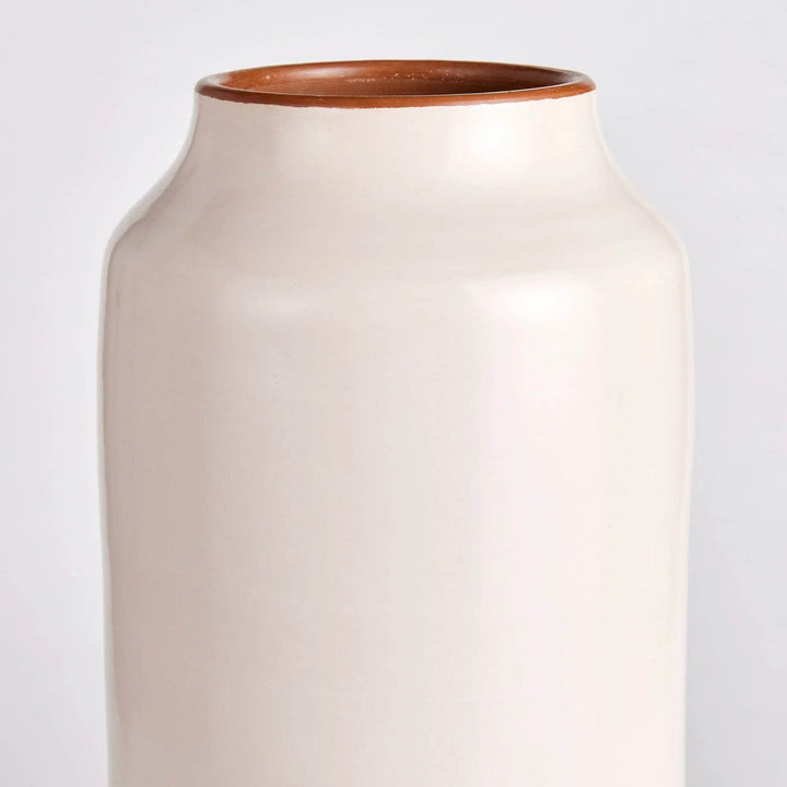 Overhead view of tall cream ceramic vase with wide mouth and raw terracotta interior for visual contrast – Modern Organic