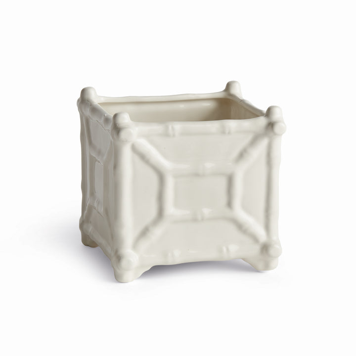 Small white square ceramic cachepot with raised bamboo-inspired detail, shown unfilled on a white background | Traditional