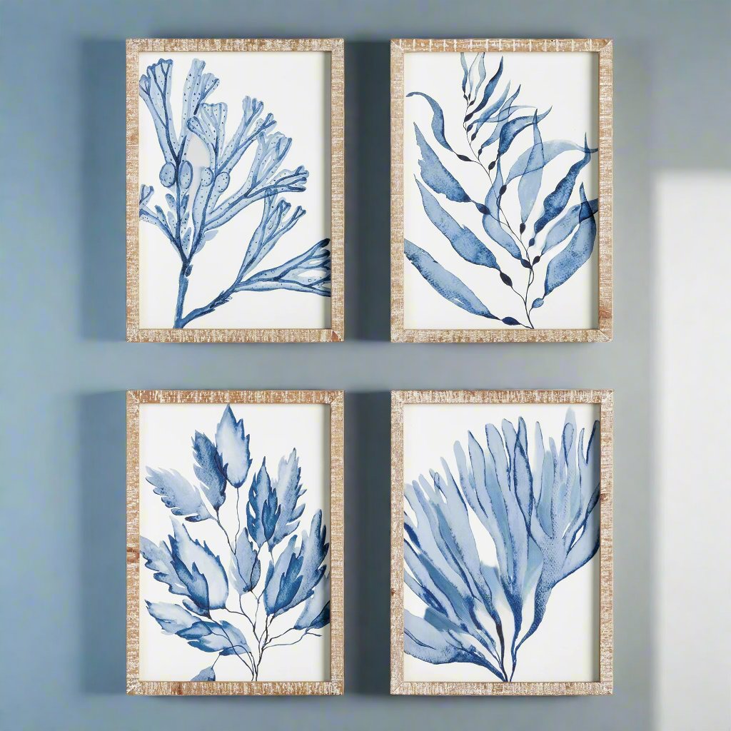 These coral prints showcase a sophisticated and high-quality design, perfect for elevating any coastal-inspired space. The delicate watercolor design and distressed whitewashed frames add to the luxurious elegance of these wall prints. Incorporate a refined and chic atmosphere with these stunning coral prints.