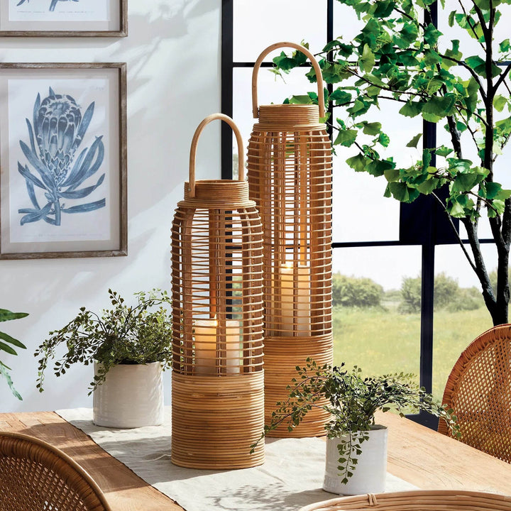 Crafted from sustainable bamboo, this tall and slim rattan lantern makes a statement while adding a touch of nature to any space. Its sleek design is perfect for coastal settings and beach houses, bringing the outdoors in with style and sustainability.