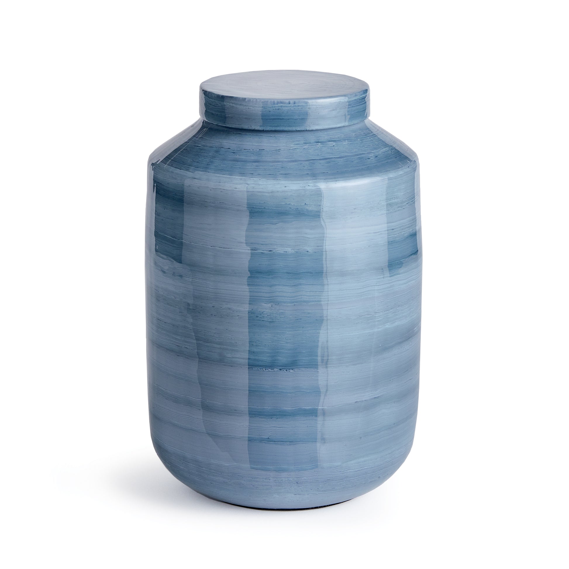 In a clever use of enameled iron, this lightweight ginger jar is painted by hand. A refined, horizontal swirl design, each one prettier than the next. With layers of delicate strokes in a coastal-inspired blue gray palette, it is modern artistry defined.