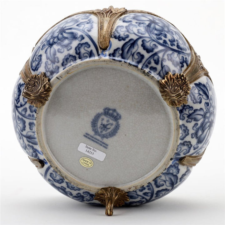Underside of porcelain floral bowl showing maker’s mark and bronze feet – Transitional