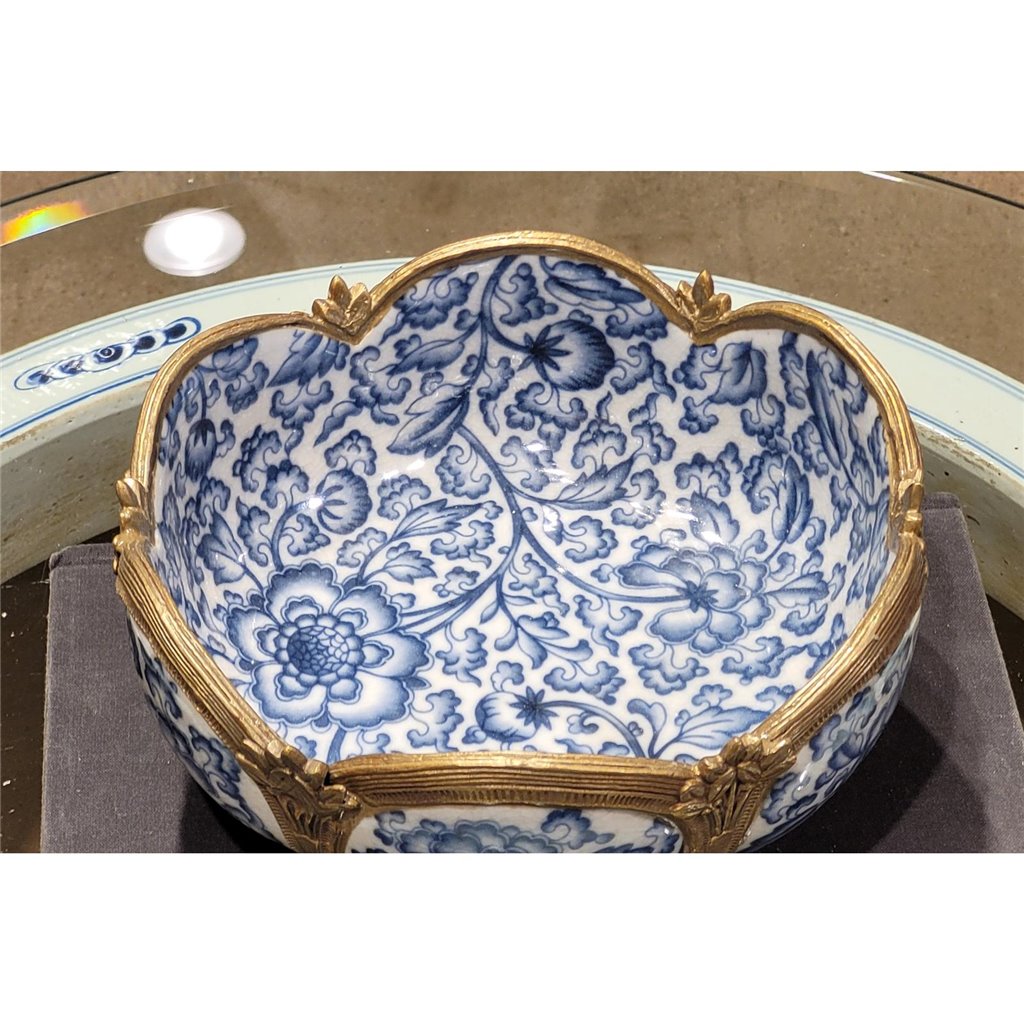 Interior view showing blue floral porcelain pattern inside decorative bowl – Transitional
