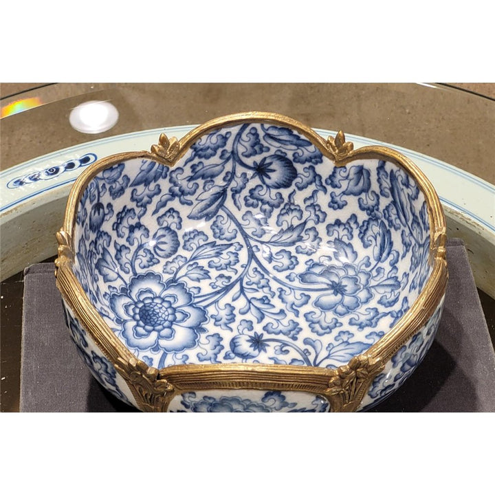 Interior view showing blue floral porcelain pattern inside decorative bowl – Transitional
