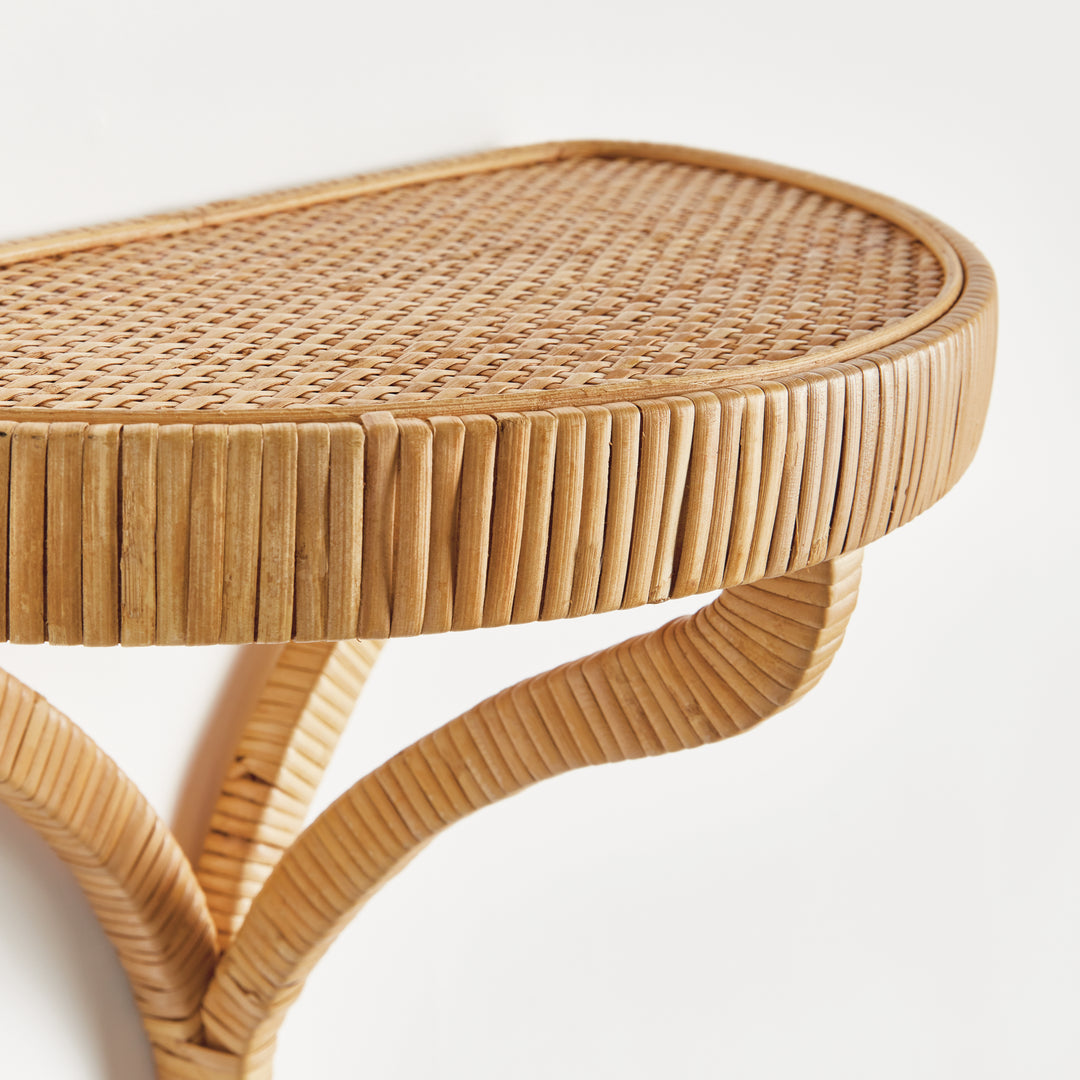 Close-up detail of woven rattan texture on decorative wall shelf surface – Natural material finish