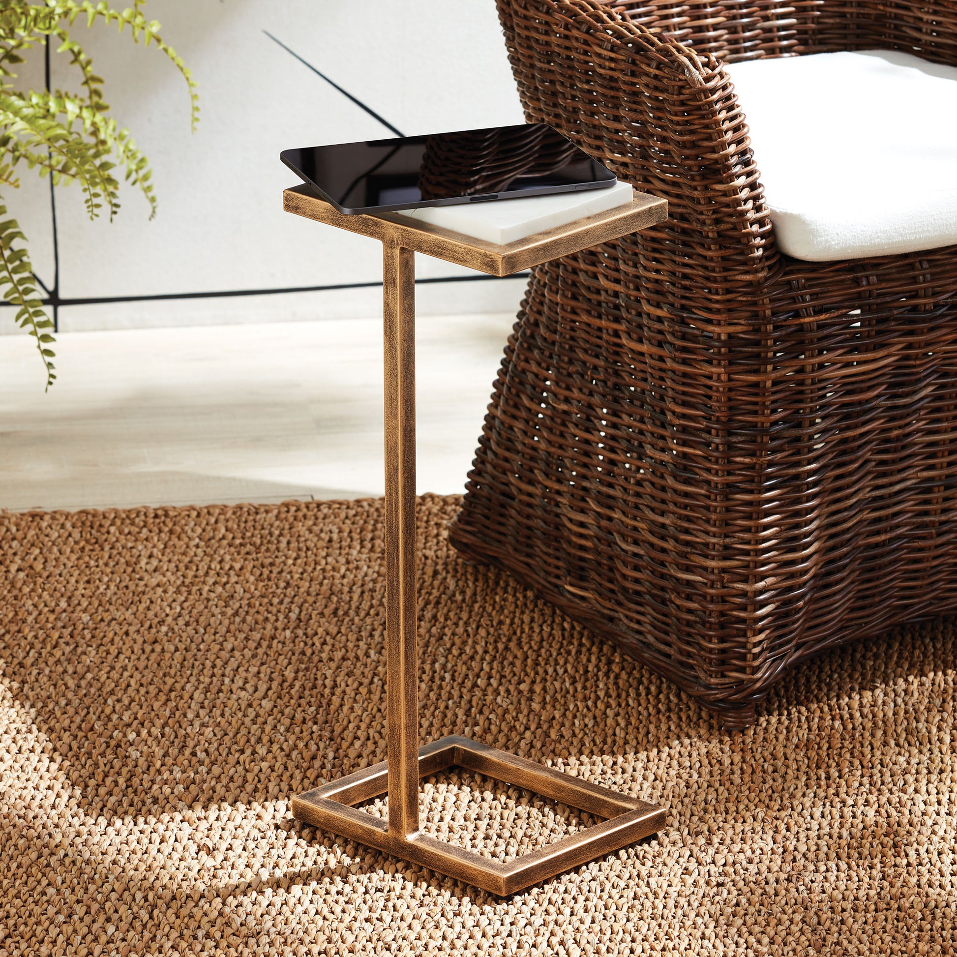 Upgrade your living space with this chic and versatile accent table, featuring an antique gold frame and a durable surface. Its compact size makes it perfect for holding drinks, desserts, and even your laptop, while adding a touch of elegance to your modern home. Effortlessly move it around and use it for stylish functionality in any room.