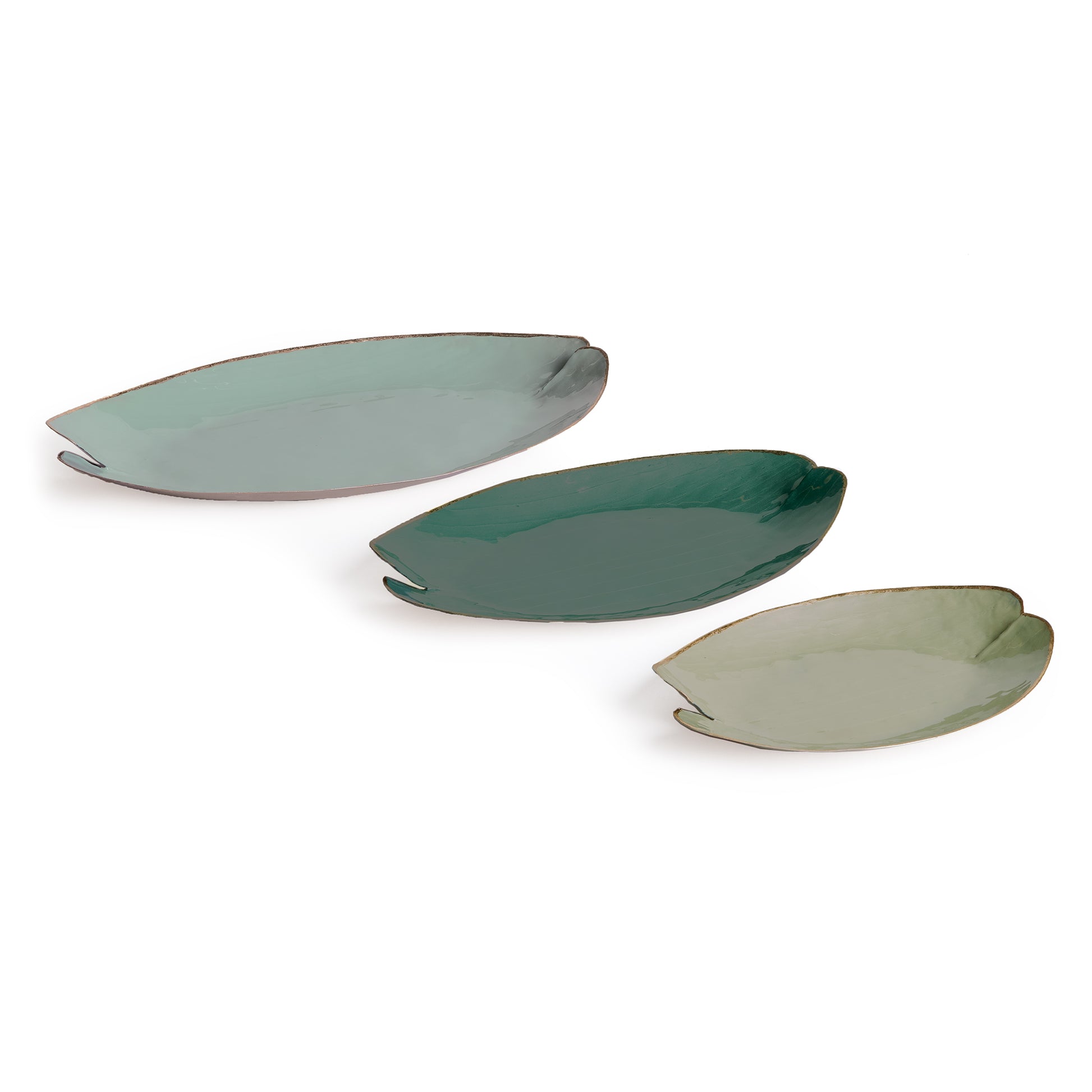This charming set of hand-painted decorative trays are inspired by lily pads. With a gold edge detail, and coordinating verdant hues, they add a pop of colorful character to kitchen island, side table or ottoman.