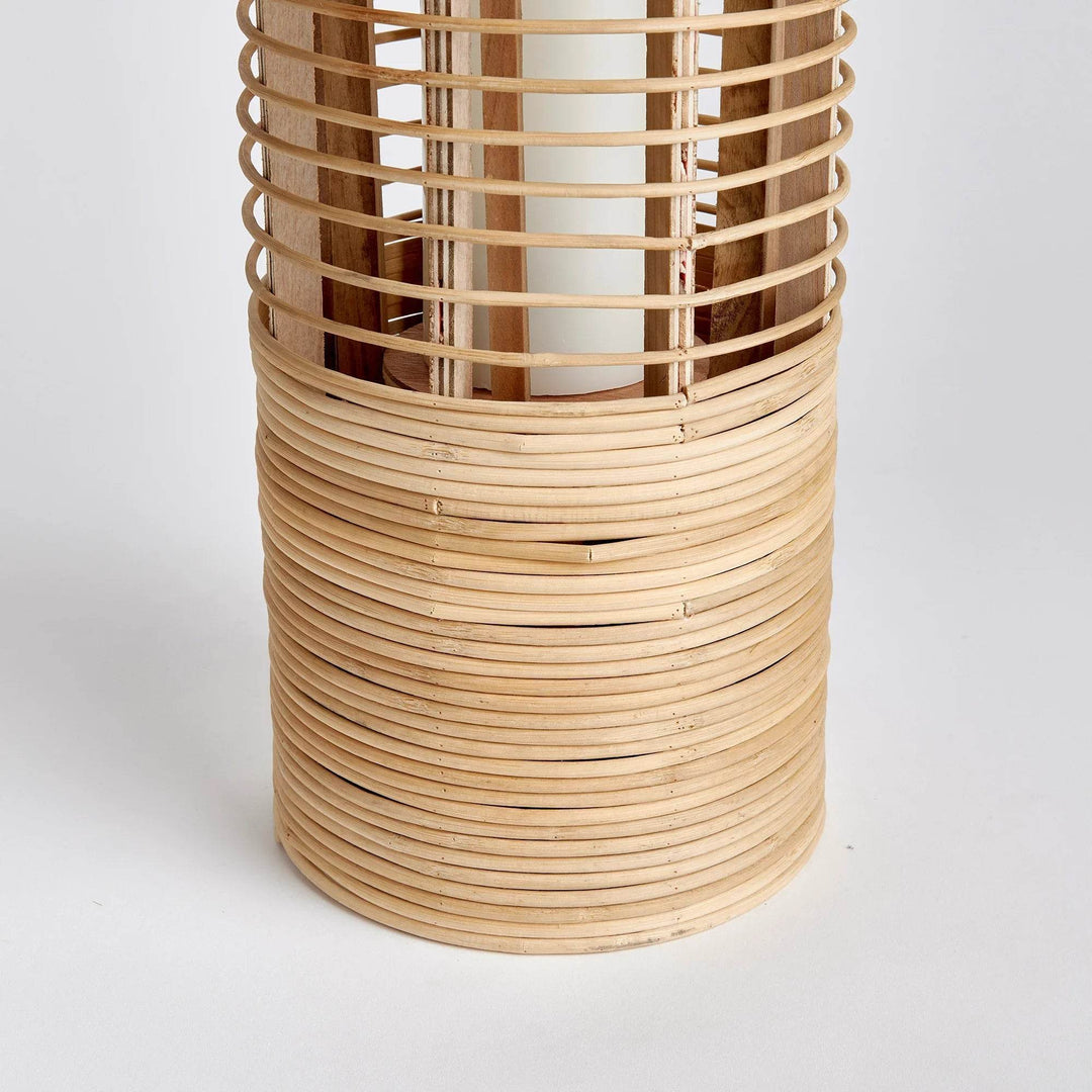 Crafted from sustainable bamboo, this tall and slim rattan lantern makes a statement while adding a touch of nature to any space. Its sleek design is perfect for coastal settings and beach houses, bringing the outdoors in with style and sustainability.