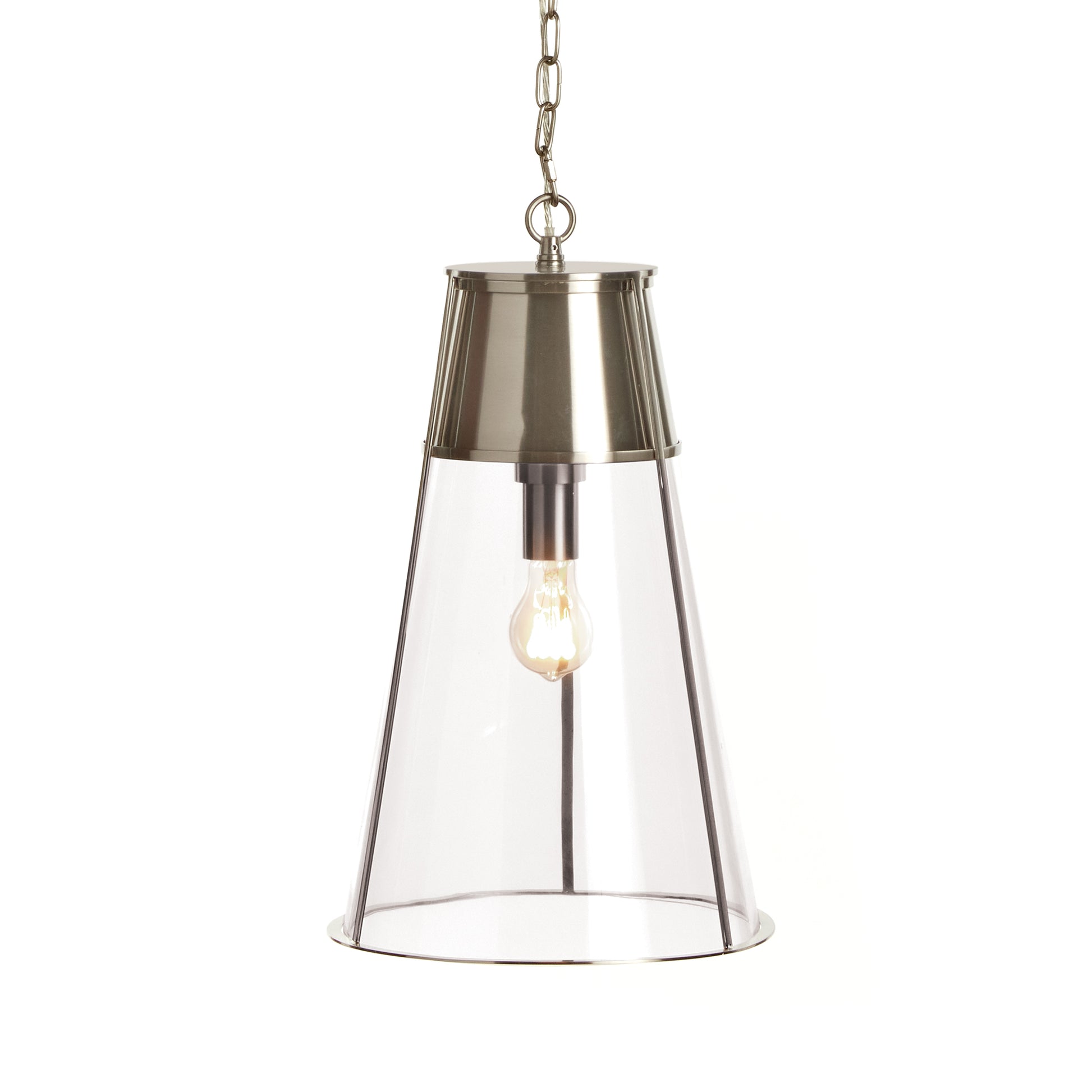 Generous in scale, and made of a modern mix of silver and glass, this pendant is a handsome fixture. Over an island, in an entry or foyer, a solid choice.