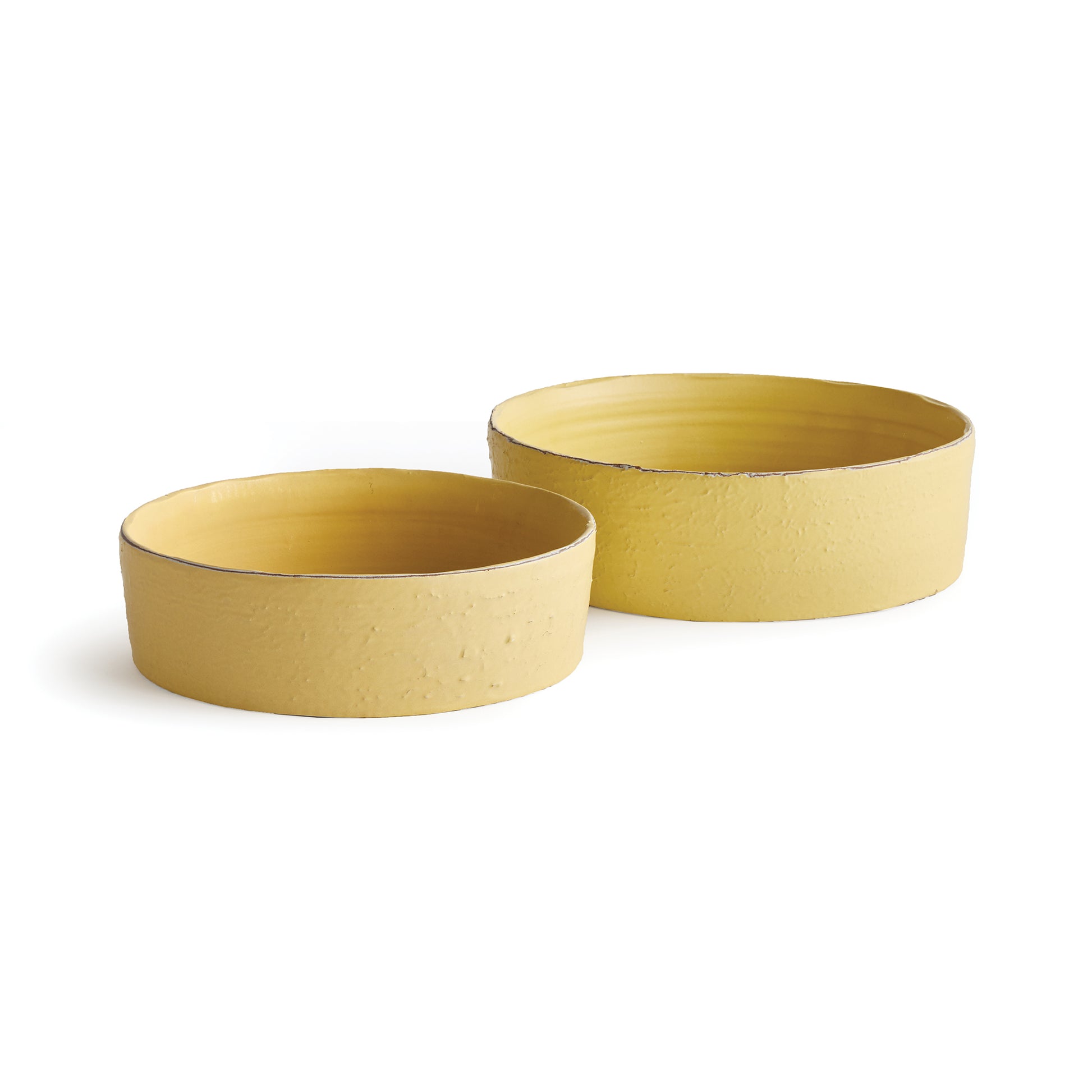 With a crackled glaze, uneven texture and basic form, this set of low bowls is simple and raw. In a refreshing buttercup yellow, like a freshly made ceramic piece direct from the hands of the artist.