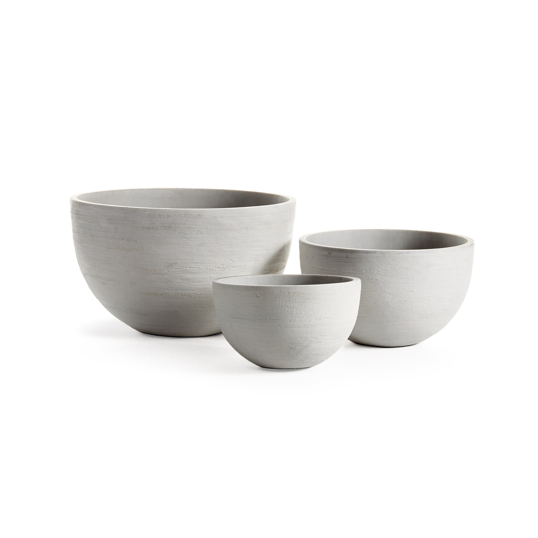 Three white bowl planters in graduated sizes, with textured curved sides displayed on a white background - Modern Organic