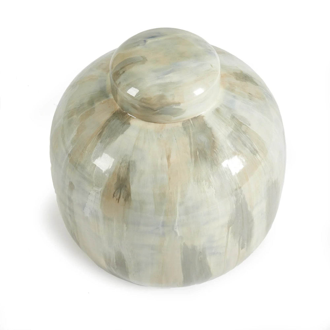 Top view of rounded enameled iron lidded urn in neutral cream and taupe, showing dome lid and reflective glossy finish – Transitional