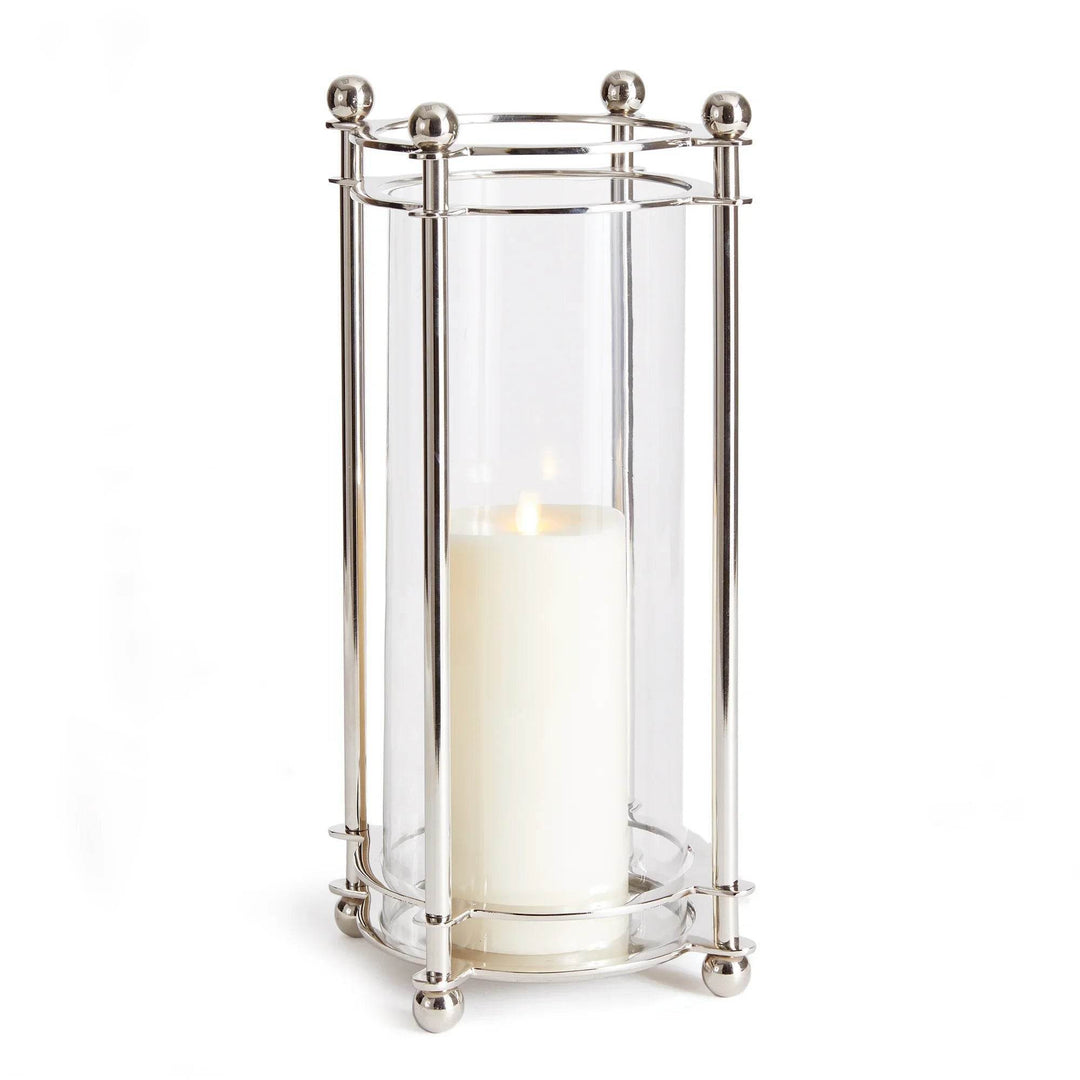 Studio image of extra tall chrome hurricane candle holder with glass cylinder and silver frame