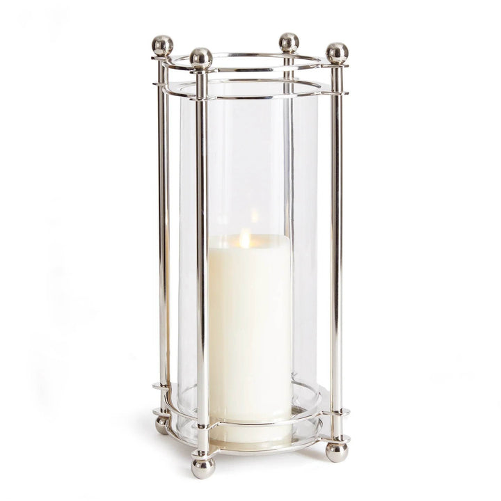 Studio image of extra tall chrome hurricane candle holder with glass cylinder and silver frame