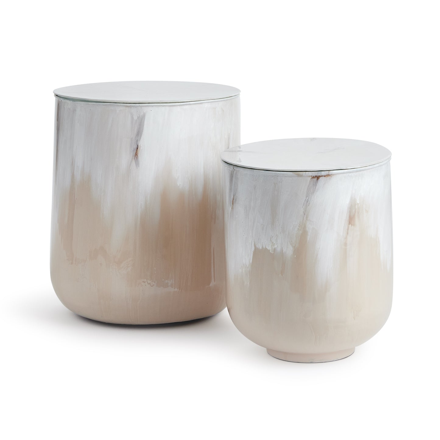 This modern pair of drum tables with removable tops are the perfect storage solution for the cozy space. In a clever use of enameled iron, they are painted by hand. With a creamy mocha palette inspired by a warm latte, with layers of milky froth and coffee tones swirling, it is modern artistry defined.