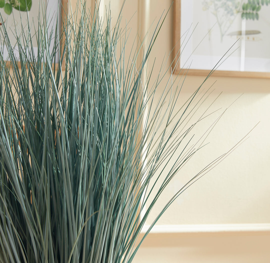 Made to look 100% realistic, this wispy blue oat grass is a natural touch. Drop in to your favorite pot or cachepot and add some coastal appeal to your space. Enhance your decor with natural, realistic botanicals. This blue oat grass adds a touch of coastal charm to any room.