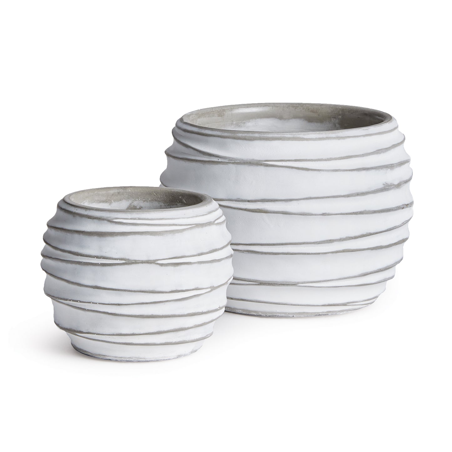 A graphic pattern of concentric circles make this set of pots very mod indeed. A translucent white wash artfully fills in the gaps. Add your favorite blooms or lush greens and enhance any contemporary space.