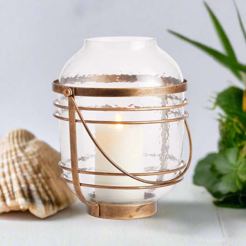 Embrace a coastal ambiance with the Gold Hurricane Coastal Theme. This elegant piece adds to the allure of a beachy weekend, especially when displayed alongside others from the collection. Infuse your space with the charm of a seaside retreat by incorporating this exquisite decor.