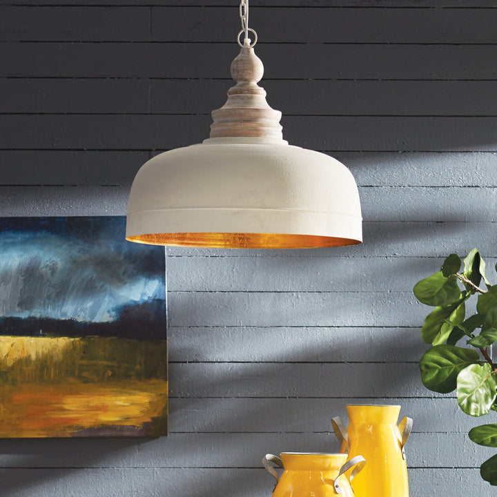 The Claudette Pendant Light expertly balances wood and metal to create a sophisticated and stylish lighting option. Illuminate your entryway, hallway, or kitchen table with elegance and grace using this well-crafted pendant light, featuring a stunning combination of materials.