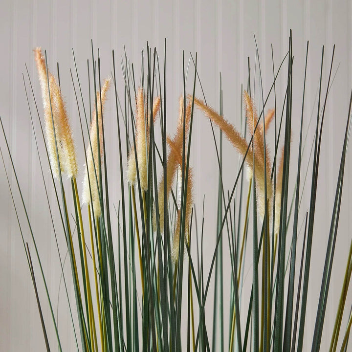 Close-up view of tall faux field grass drop-in with realistic green blades and golden tips for natural indoor greenery styling – Modern Organic.

