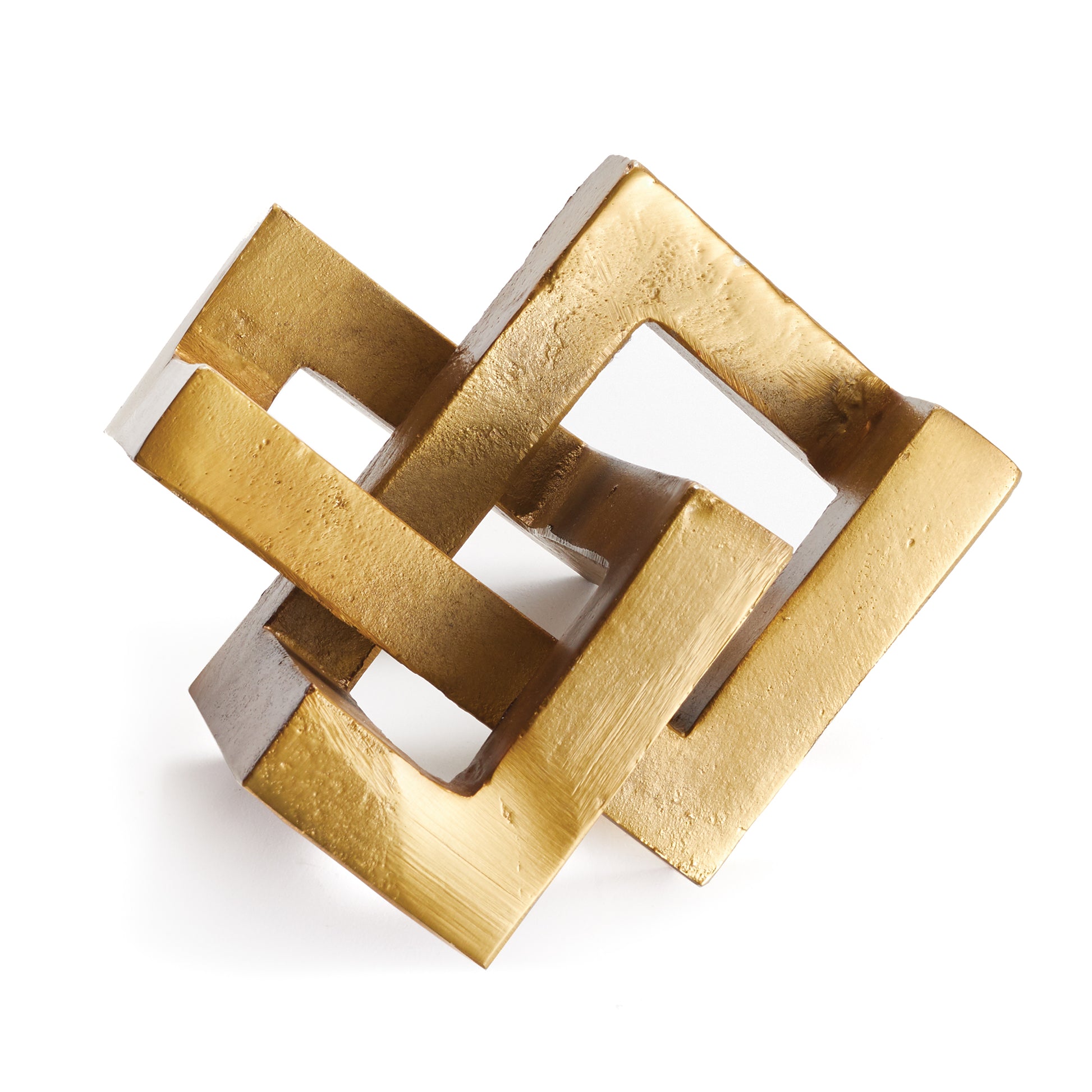 A geometric marvel, this linear sculpture is a strong accent in warm brass. Place atop a stack of books or nestled in a bookshelf for a modern touch.