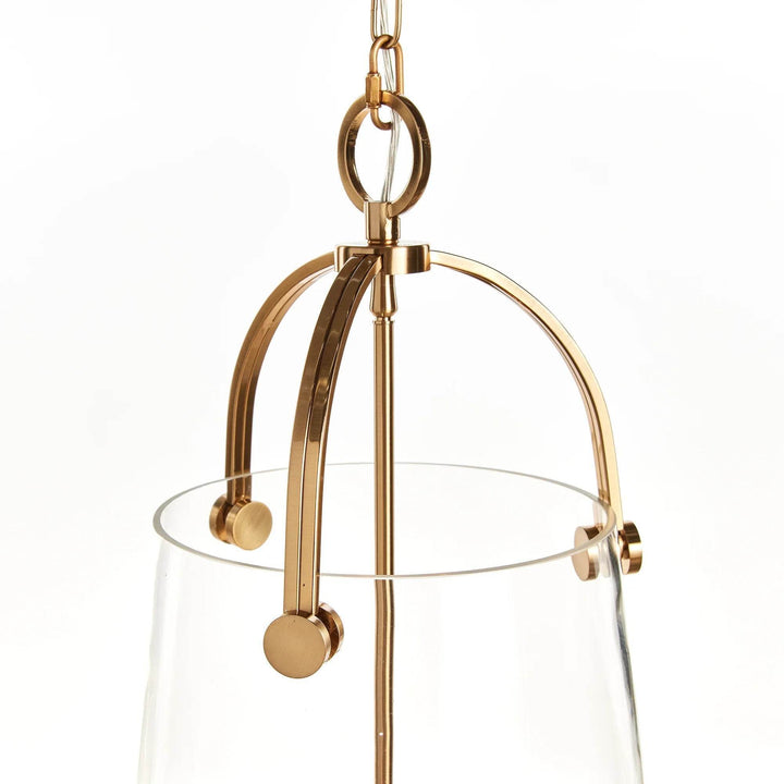 Gold Accent Glass Chandelier with Unique Metal Details