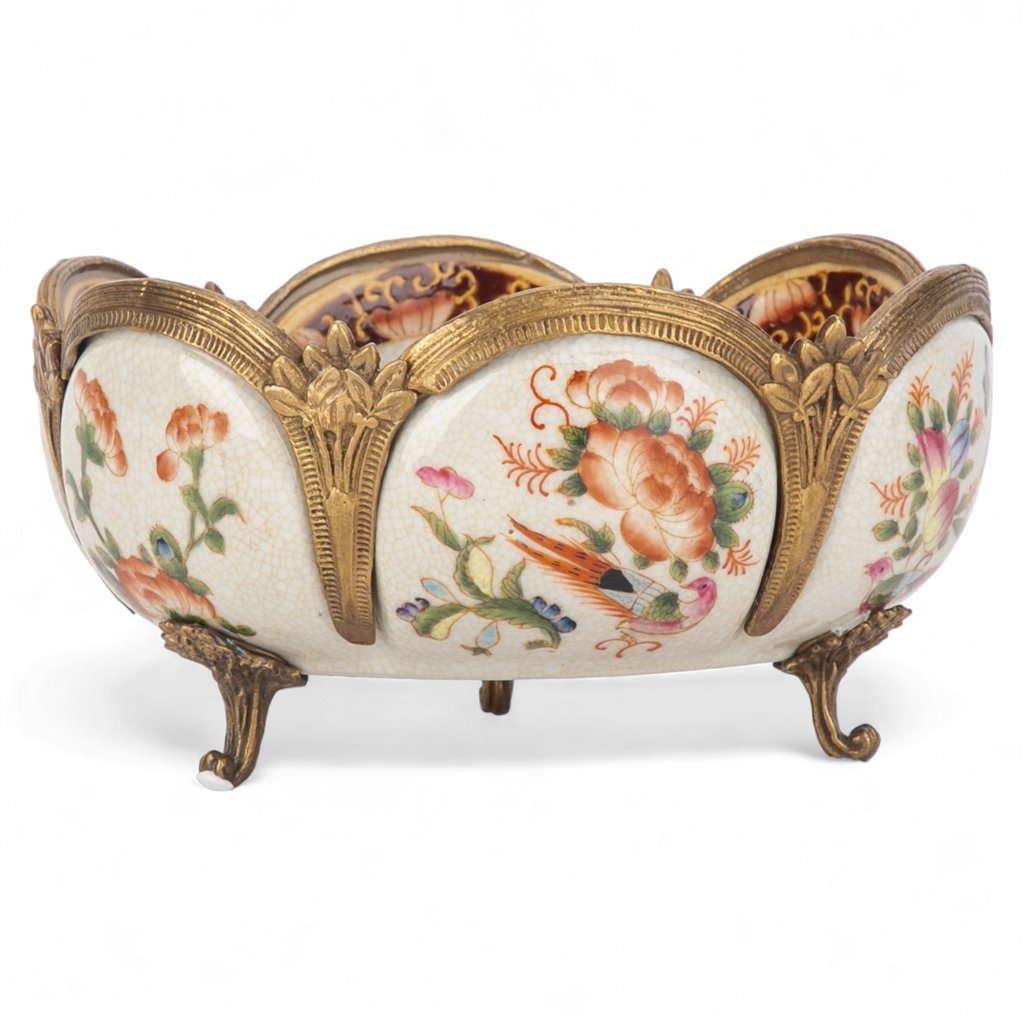 Profile view of porcelain decorative bowl with bronze ormolu mounts and hand-painted floral pattern – Traditional style