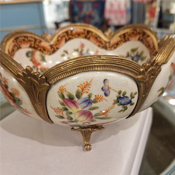 Side view of floral porcelain decorative bowl with bronze ormolu detailing and multicolor botanical motif – Traditional style