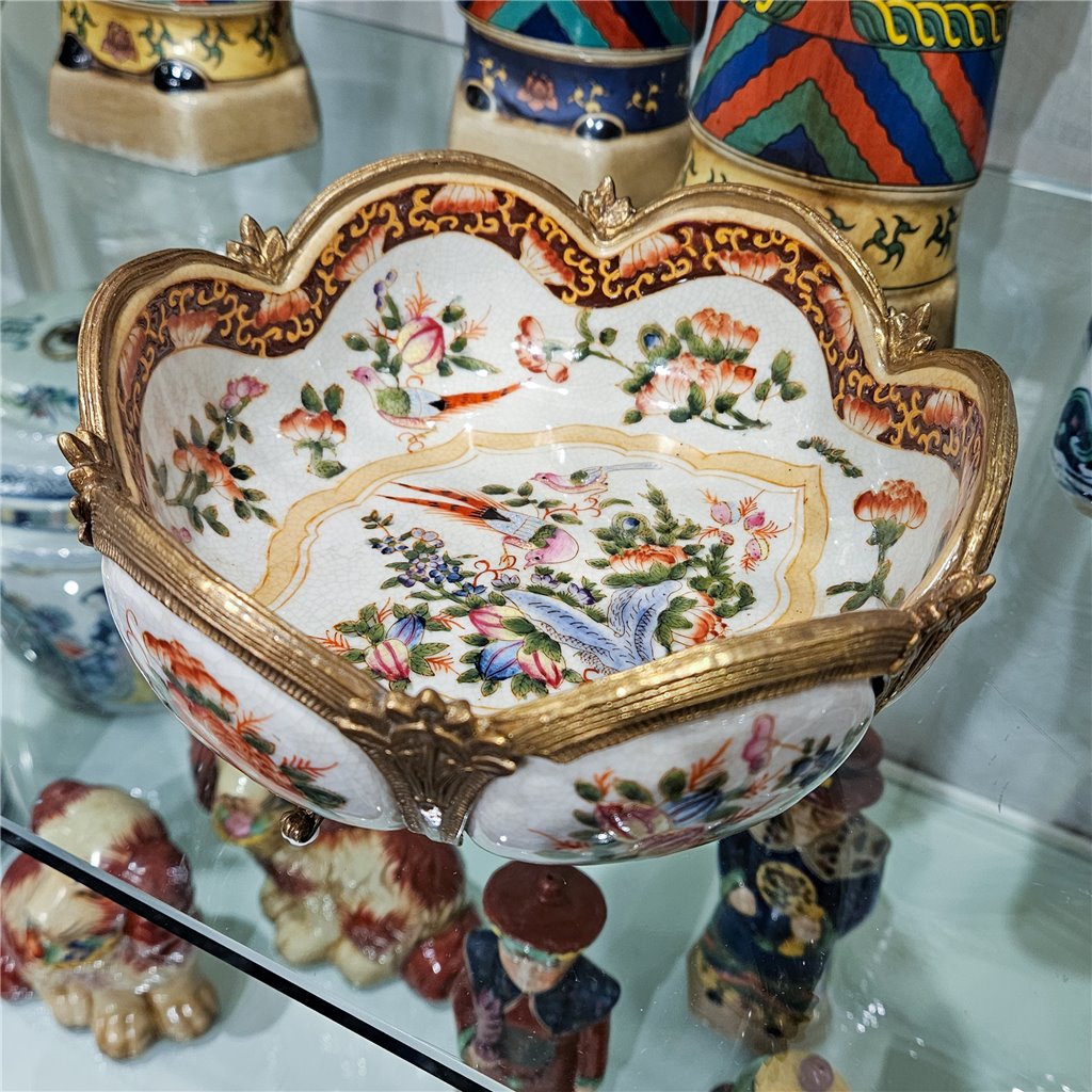 Top view of floral porcelain decorative bowl showing scalloped rim and detailed multicolor floral interior – Traditional style