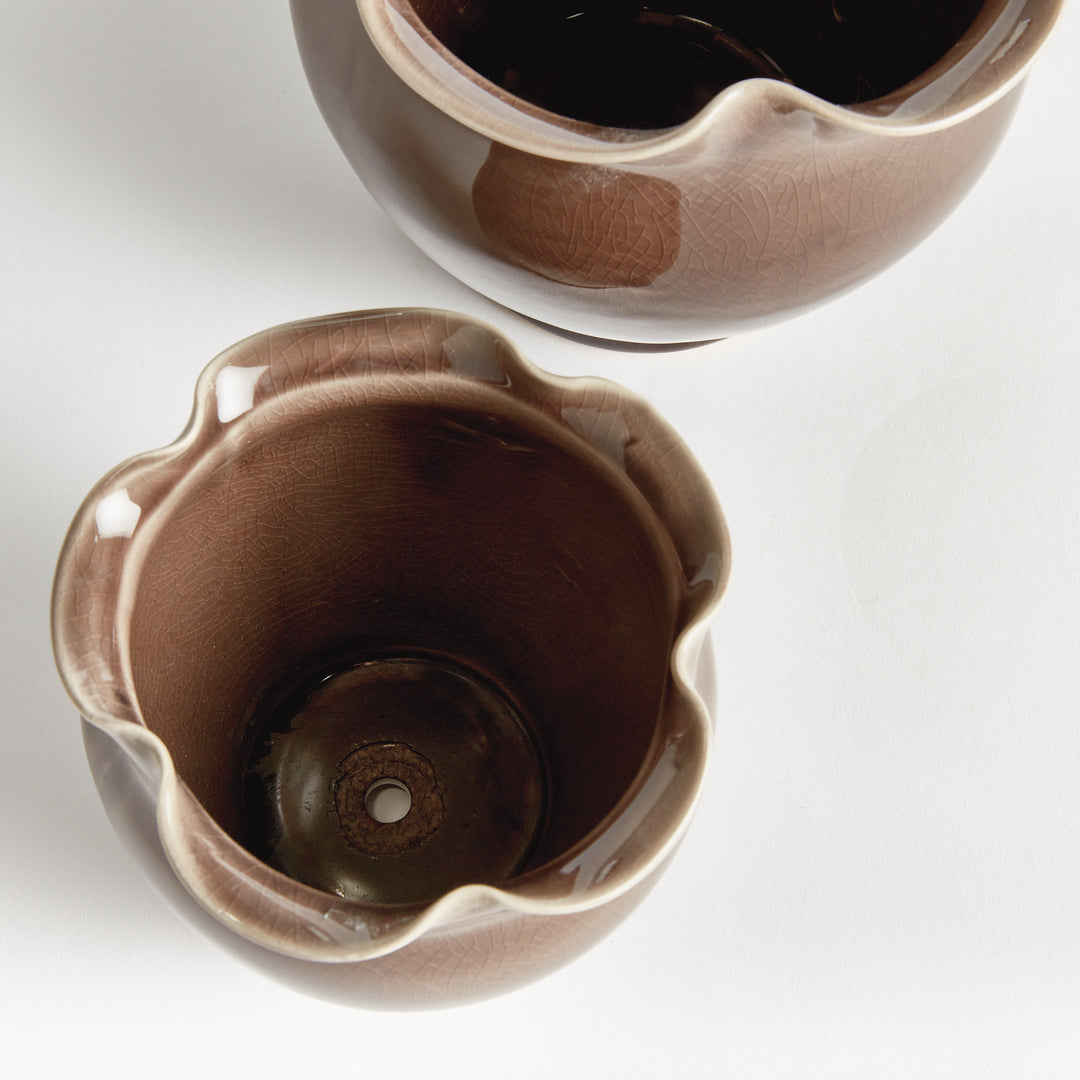 Brown ceramic planter pair viewed from above, showing the glazed interiors, wavy rims and drainage hole. Classic Transitional