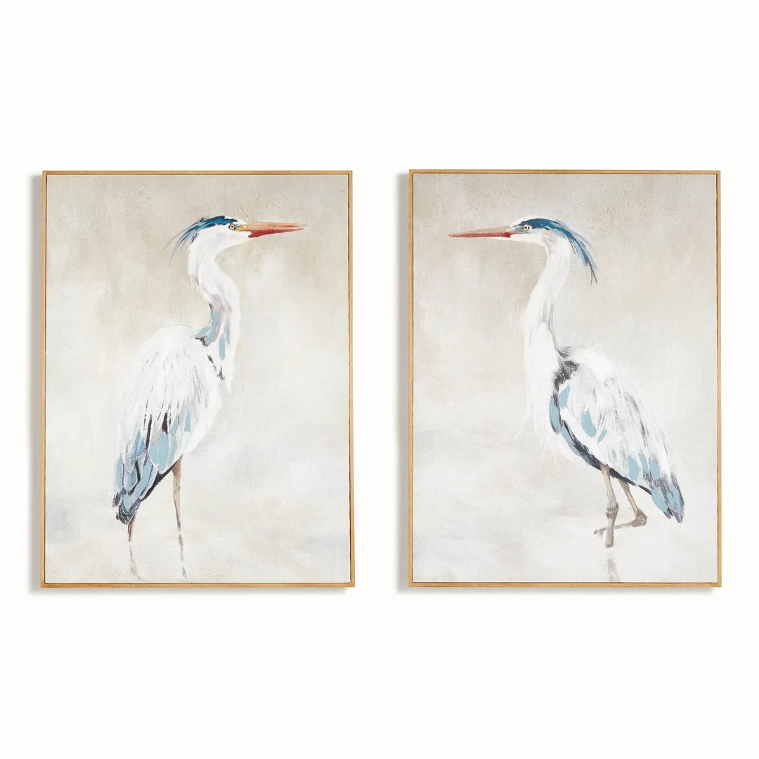 Two framed heron giclee prints on canvas, with backgrounds and natural wood frames, shown side by side, Coastal Transitional