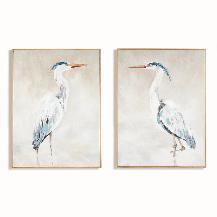 Two framed heron giclee prints on canvas, with backgrounds and natural wood frames, shown side by side, Coastal Transitional